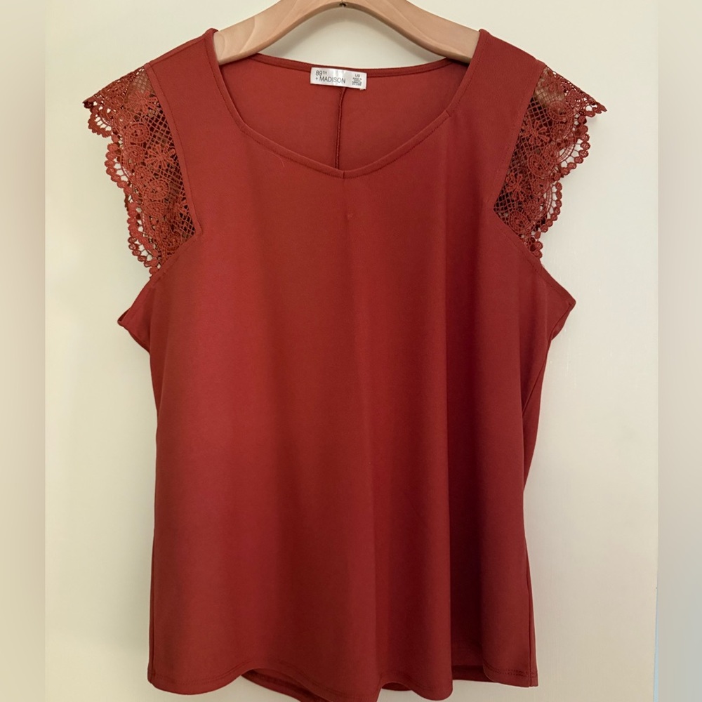 NWOT Lacy Flutter Sleeveless  Blouse